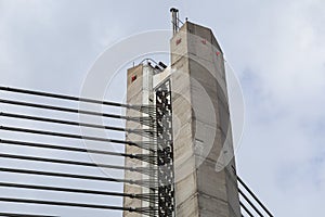 Close details of old large suspension bridge