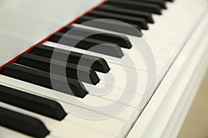 Close frontal . The piano was set up in the music room to allow the pianist to rehearse before the classical piano performance in