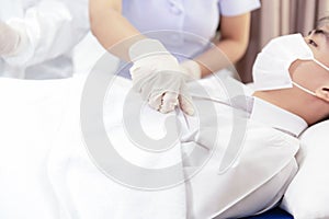 Close hand Nurse women visit and treatment