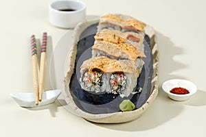 Close Japanese Mentai Sushi Salmon on Blue Plate