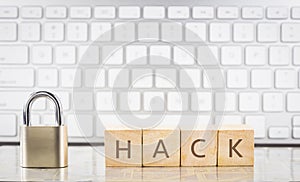 Close key lock with word HACK, keyboard background