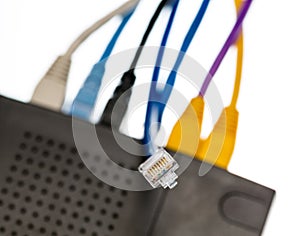 Cat5 cables and router for cyberdefence concept photo