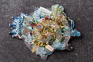 Close macro photograph of an artificially synthesized bismuth crystal