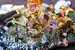 Close macro photograph of an artificially synthesized bismuth crystal