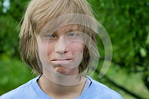 Close-Mouthed Teen Boy