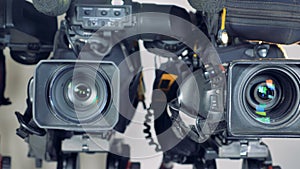A close moving shot on large video cameras.