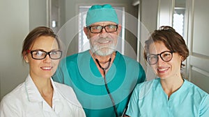 Close portrait of smiling doctors at the clinic. Medical personnel, specialists in the field of dentistry, cosmetology