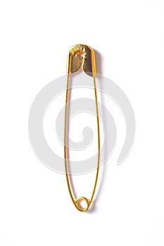 Close safety pin isolated on white background with copy space for your text