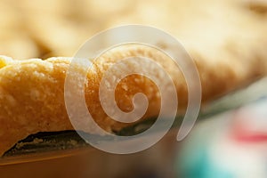 Close shot of the edge of a pie crust photo