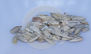 Close shot of the edible peeled sunflower seeds