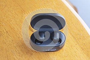 Close shot image of black wireless earpod.