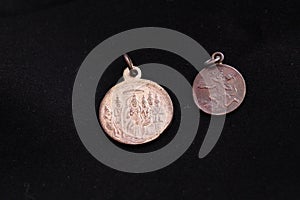 Antique silver coins with lord engraved on it photo