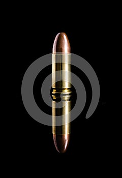 close-up 9mm bullet for a gun and reflection isolated on a black background are Suitable for creative graphic design
