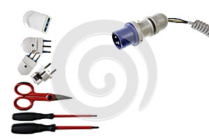 Close up from above of work tools and components for electrical installations, isolated on white background