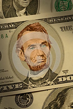 Close-up of Abraham Lincoln on the $5 bill