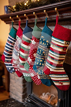 A close-up of abstract frost patterns on a window, resembling a forest of bare branches, with subtle background lights
