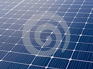 Close up abstract view of a blue solar panel grid texture