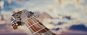 Close-up of an acoustic guitar headstock