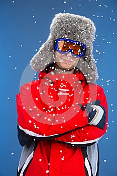 Close up of active man freezing in snow.