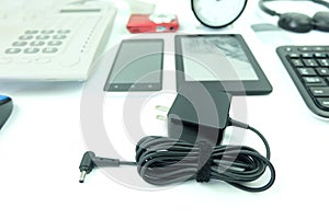 Close up Adapter acdc power charger of laptop computer and blurred Used modern Electronic gadgets for daily use isolated on white