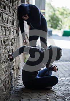 Close up of addicts and drug syringes