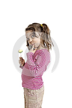 Close-up of adorable little girl with a lollipop