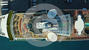 Close up Aerial footage of a large Cruise ship upper deck in the port of Rhodes in Parking lot