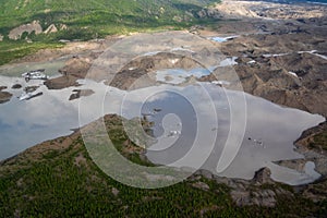 Close up aerial view of moraine, silt of Root Glacier in Wrangell St Elias National Park