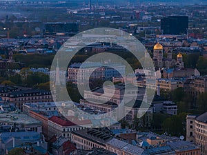 Close up aerial view of the old town of Riga at dusk.