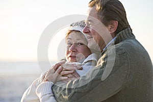 Close up of affectionate mature couple hugging