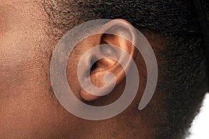 Close up of african american woman`s ear