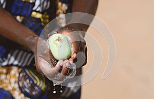 Close Up Of African Black Boy Washing Hands to Avoid Contacting Virus like Coronavirus