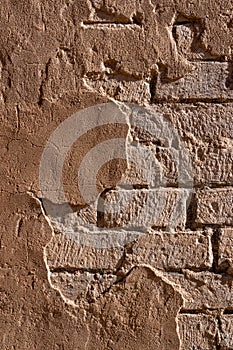 Close up of aged adobe wall