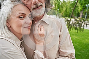 Close up of aged woman leaning on her partner