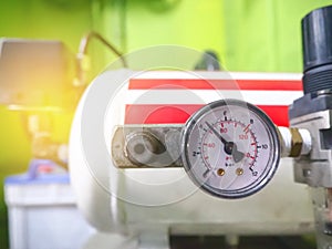 Close Up of air compressors pressure measurement pumps