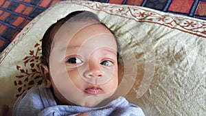 Close up of Alert Healthy Indian infant baby