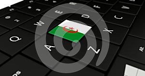 Close up of Algeria button.