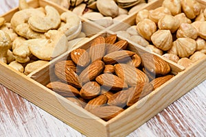 Close-up of almonds in a wooden box