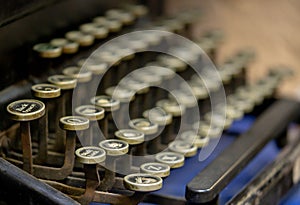 Close up of alphabet keys on a vintage manual typewriter.