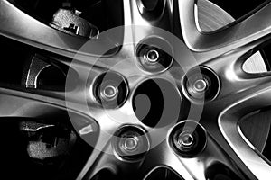 Close-up of aluminium rim of luxury car wheel