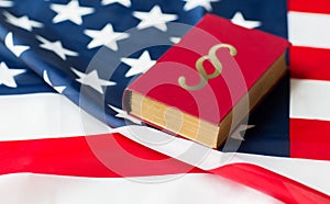 Close up of american flag and lawbook