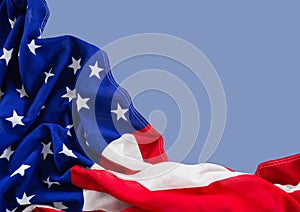 Close up of american flag on light blue background