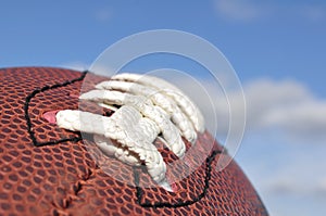 Close-up of American Football Texture and Laces