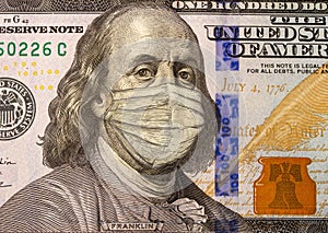 Close up American hundred dollar bill and Benjamin Franklin wearing a medical mask stylized as an engraving