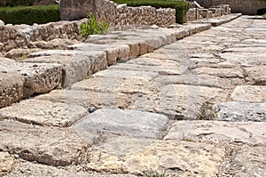 Close up of ancient roman road ruins in Tarraco forum Tarragona photo