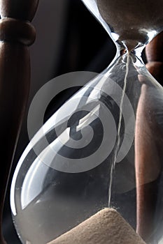 Close up of sand going through an hour glass