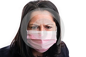 Close-up of angry businesswoman eyes wearing covid19 mask