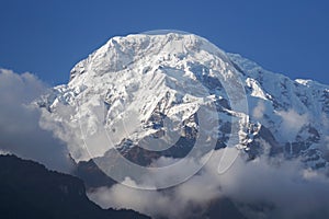 close up Annapurna South peak full with first white snow in winter