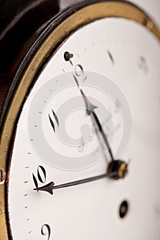 Close-up of antique clock, nearly midnight