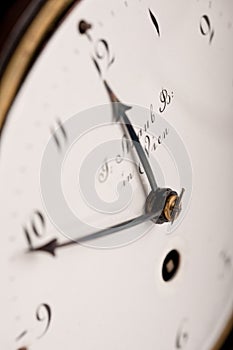 Close-up of antique clock, nearly midnight